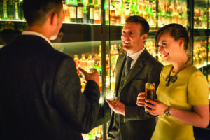 Drinks reception in the Whisky Collection with couple